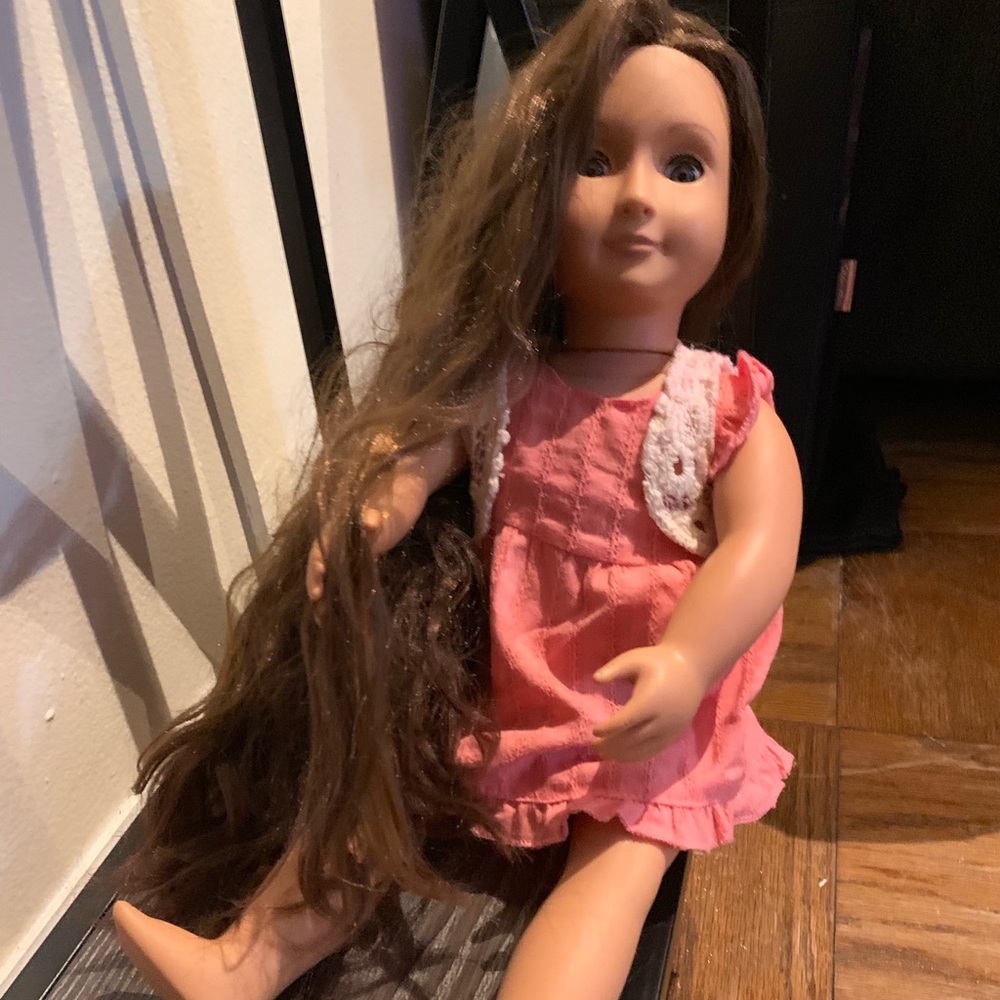 Girl doll with long hair.